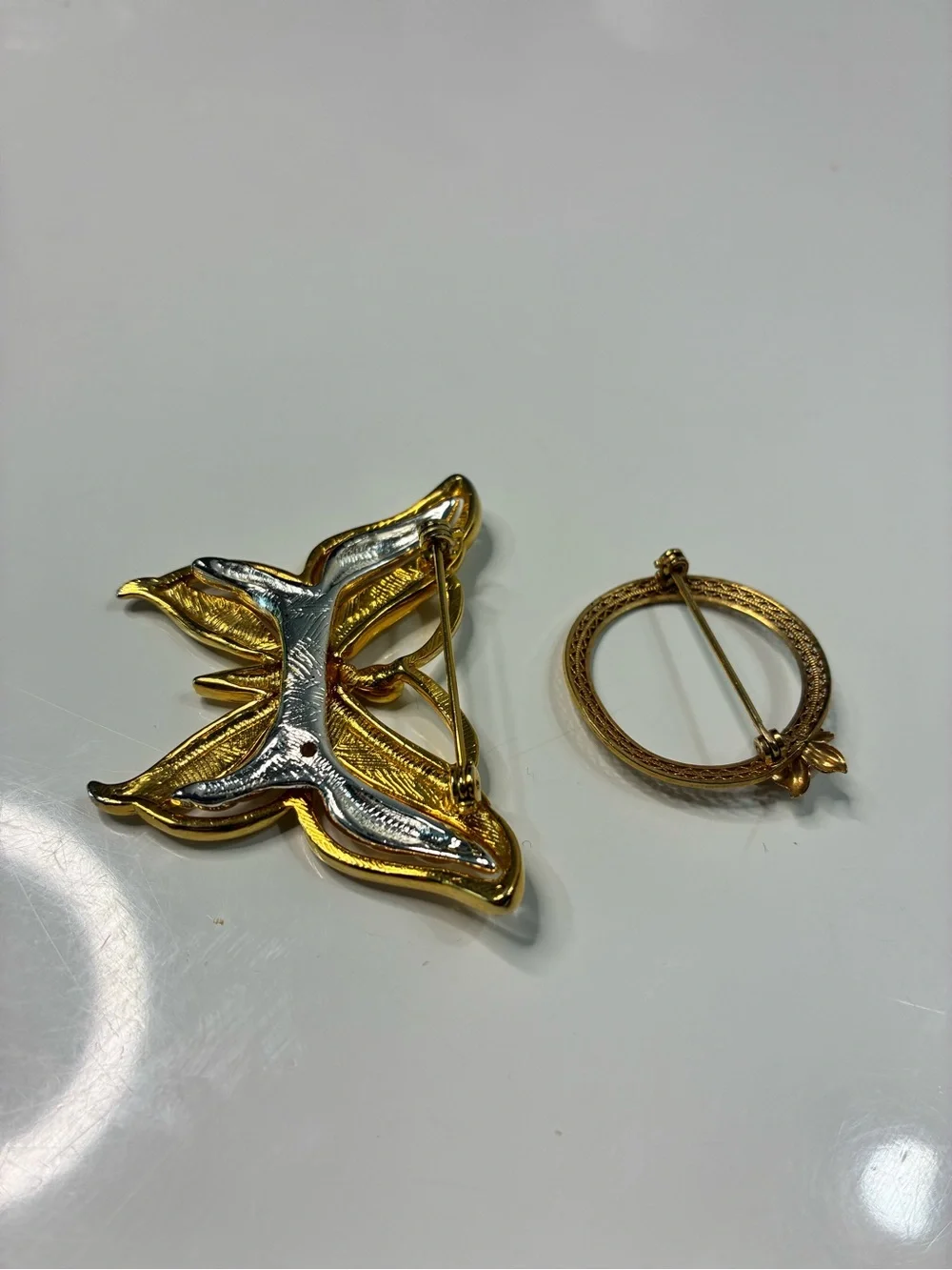 Two-Tone Gold and Silver Butterfly Brooch and Classic Infinity Floral Pin